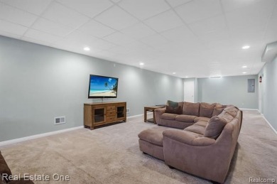 Custom built ranch with finished basement & a covered 288 sf on The Orchards Golf Club in Michigan - for sale on GolfHomes.com, golf home, golf lot