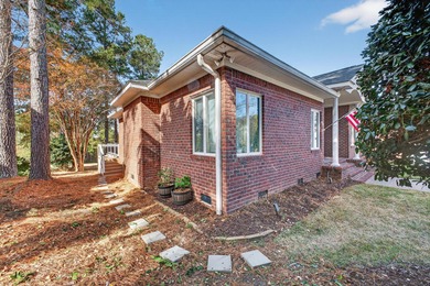 Welcome to this gorgeous 3-bedroom, 2.5-bathroom brick home with on Woodside Plantation Country Club in South Carolina - for sale on GolfHomes.com, golf home, golf lot
