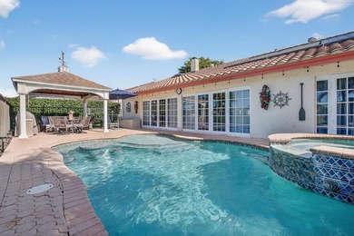 Welcome to this exceptional residence where charm, comfort, and on Woodmont Country Club in Florida - for sale on GolfHomes.com, golf home, golf lot