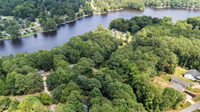 Don't miss this opportunity to own a versatile lot in the on River Golf and County Club at Lake Royale in North Carolina - for sale on GolfHomes.com, golf home, golf lot