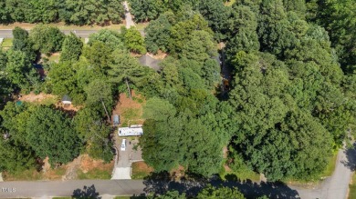 Don't miss this opportunity to own a versatile lot in the on River Golf and County Club at Lake Royale in North Carolina - for sale on GolfHomes.com, golf home, golf lot