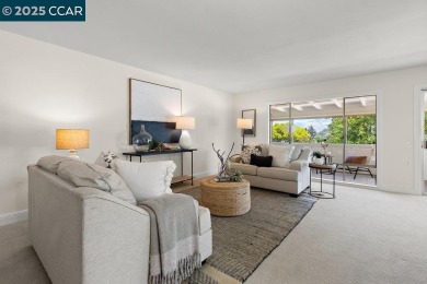 This bright and cheerful Sequoia Wrap end-unit is like a tree on Rossmoor Golf Course in California - for sale on GolfHomes.com, golf home, golf lot