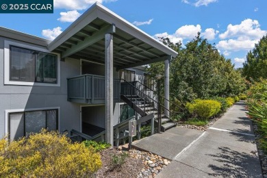 This bright and cheerful Sequoia Wrap end-unit is like a tree on Rossmoor Golf Course in California - for sale on GolfHomes.com, golf home, golf lot