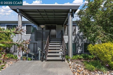 This bright and cheerful Sequoia Wrap end-unit is like a tree on Rossmoor Golf Course in California - for sale on GolfHomes.com, golf home, golf lot