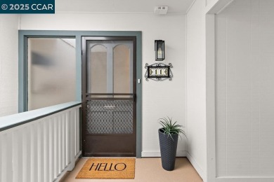 This bright and cheerful Sequoia Wrap end-unit is like a tree on Rossmoor Golf Course in California - for sale on GolfHomes.com, golf home, golf lot