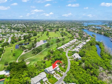 Step into paradise with this 2-bed, 2.5-bath townhouse nestled on Riverbend Golf Club in Florida - for sale on GolfHomes.com, golf home, golf lot