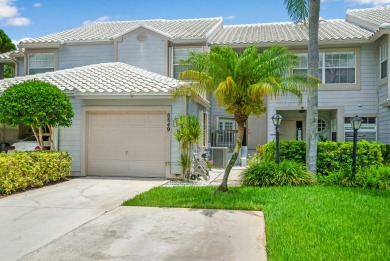 Step into paradise with this 2-bed, 2.5-bath townhouse nestled on Riverbend Golf Club in Florida - for sale on GolfHomes.com, golf home, golf lot