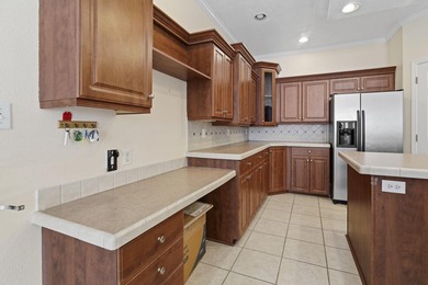 Welcome to this beautifully maintained 3-bedroom, 2-bath  Palm on Burning Ridge Golf Course in South Carolina - for sale on GolfHomes.com, golf home, golf lot