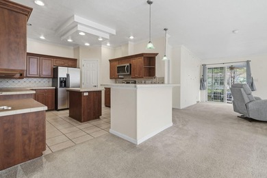 Welcome to this beautifully maintained 3-bedroom, 2-bath  Palm on Burning Ridge Golf Course in South Carolina - for sale on GolfHomes.com, golf home, golf lot