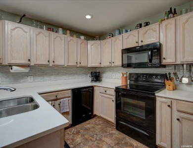 Discover your dream home that boasts breathtaking lake and golf on Diamondhead Golf and Country Club in Arkansas - for sale on GolfHomes.com, golf home, golf lot