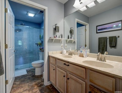 Discover your dream home that boasts breathtaking lake and golf on Diamondhead Golf and Country Club in Arkansas - for sale on GolfHomes.com, golf home, golf lot