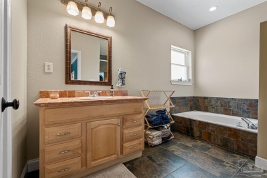 Welcome to this elevated Gulf Breeze retreat where timeless on Tiger Point Golf and Country Club in Florida - for sale on GolfHomes.com, golf home, golf lot