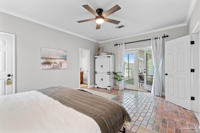 Welcome to this elevated Gulf Breeze retreat where timeless on Tiger Point Golf and Country Club in Florida - for sale on GolfHomes.com, golf home, golf lot