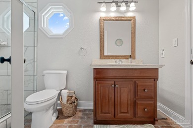 Welcome to this elevated Gulf Breeze retreat where timeless on Tiger Point Golf and Country Club in Florida - for sale on GolfHomes.com, golf home, golf lot