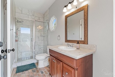 Welcome to this elevated Gulf Breeze retreat where timeless on Tiger Point Golf and Country Club in Florida - for sale on GolfHomes.com, golf home, golf lot
