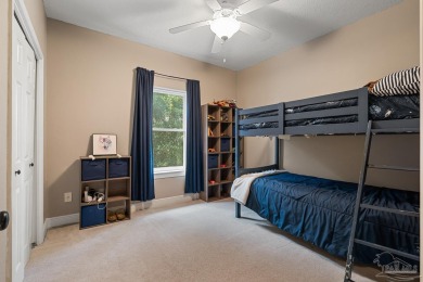Welcome to this elevated Gulf Breeze retreat where timeless on Tiger Point Golf and Country Club in Florida - for sale on GolfHomes.com, golf home, golf lot