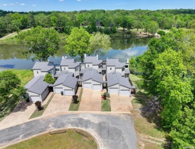 Discover your dream home that boasts breathtaking lake and golf on Diamondhead Golf and Country Club in Arkansas - for sale on GolfHomes.com, golf home, golf lot