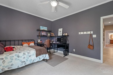 Welcome to this elevated Gulf Breeze retreat where timeless on Tiger Point Golf and Country Club in Florida - for sale on GolfHomes.com, golf home, golf lot