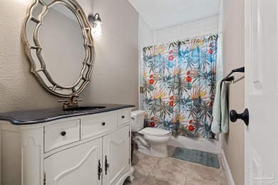 Welcome to this elevated Gulf Breeze retreat where timeless on Tiger Point Golf and Country Club in Florida - for sale on GolfHomes.com, golf home, golf lot