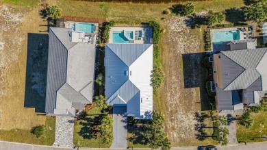 This exquisite pool home is a masterpiece of coastal elegance on The Ocean Course At Hammock Beach Resort in Florida - for sale on GolfHomes.com, golf home, golf lot