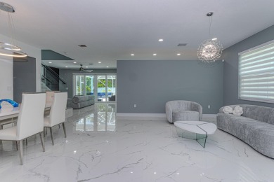 Completely Renovated Pool Home in Madison Green!This 4-bedroom on The Links At Madison Green in Florida - for sale on GolfHomes.com, golf home, golf lot