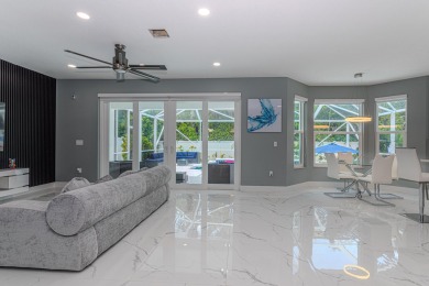 Completely Renovated Pool Home in Madison Green!This 4-bedroom on The Links At Madison Green in Florida - for sale on GolfHomes.com, golf home, golf lot