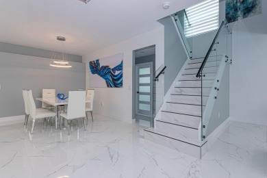 Completely Renovated Pool Home in Madison Green!This 4-bedroom on The Links At Madison Green in Florida - for sale on GolfHomes.com, golf home, golf lot