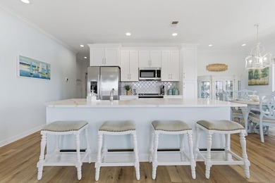 Experience panoramic Intracoastal Waterway views in Little River on The Valley At Eastport in South Carolina - for sale on GolfHomes.com, golf home, golf lot