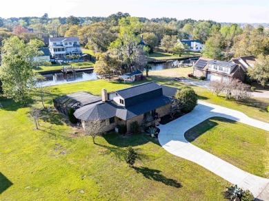 Welcome to 47 Swamp Fox Ln! Nestled in the charming town of on Wedgefield Plantation Golf Club in South Carolina - for sale on GolfHomes.com, golf home, golf lot