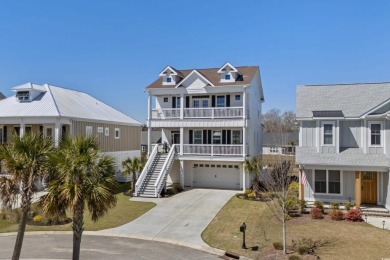 This custom-built raised beach home in the gated community of on Arrowhead Country Club in South Carolina - for sale on GolfHomes.com, golf home, golf lot