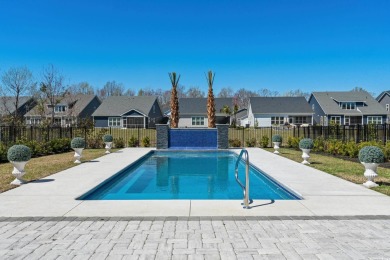 This custom-built raised beach home in the gated community of on Arrowhead Country Club in South Carolina - for sale on GolfHomes.com, golf home, golf lot