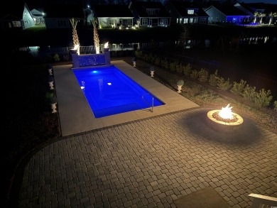 This custom-built raised beach home in the gated community of on Arrowhead Country Club in South Carolina - for sale on GolfHomes.com, golf home, golf lot