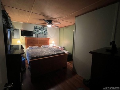 Large 2 lot, 2 bedroom, 1 bath home. Large back deck for on River Ridge Golf Club in Virginia - for sale on GolfHomes.com, golf home, golf lot