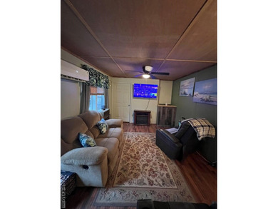 Large 2 lot, 2 bedroom, 1 bath home. Large back deck for on River Ridge Golf Club in Virginia - for sale on GolfHomes.com, golf home, golf lot