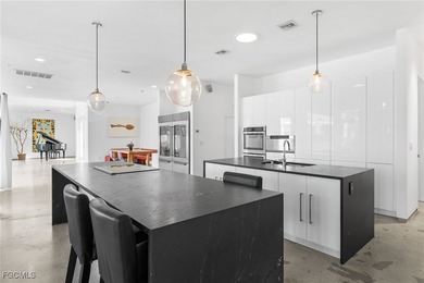 Step into a world where elegance meets effortless living. This on Gulf Harbour Yacht and Country Club in Florida - for sale on GolfHomes.com, golf home, golf lot