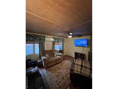 Large 2 lot, 2 bedroom, 1 bath home. Large back deck for on River Ridge Golf Club in Virginia - for sale on GolfHomes.com, golf home, golf lot