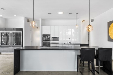 Step into a world where elegance meets effortless living. This on Gulf Harbour Yacht and Country Club in Florida - for sale on GolfHomes.com, golf home, golf lot