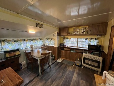 Large 2 lot, 2 bedroom, 1 bath home. Large back deck for on River Ridge Golf Club in Virginia - for sale on GolfHomes.com, golf home, golf lot