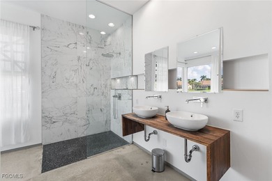 Step into a world where elegance meets effortless living. This on Gulf Harbour Yacht and Country Club in Florida - for sale on GolfHomes.com, golf home, golf lot