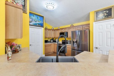 Welcome to Harbor Hills!  This house in just inside the main on Harbor Hills Country Club in Florida - for sale on GolfHomes.com, golf home, golf lot