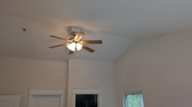 PRICED TO SELL AND MAKE YOUR OWN.  A NEW ROOF and a whole house on St. James Bay in Florida - for sale on GolfHomes.com, golf home, golf lot