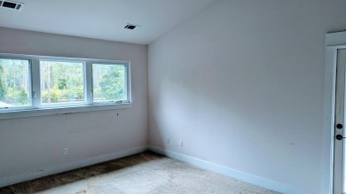 PRICED TO SELL AND MAKE YOUR OWN.  A NEW ROOF and a whole house on St. James Bay in Florida - for sale on GolfHomes.com, golf home, golf lot