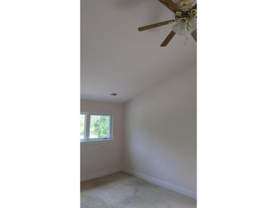 PRICED TO SELL AND MAKE YOUR OWN.  A NEW ROOF and a whole house on St. James Bay in Florida - for sale on GolfHomes.com, golf home, golf lot