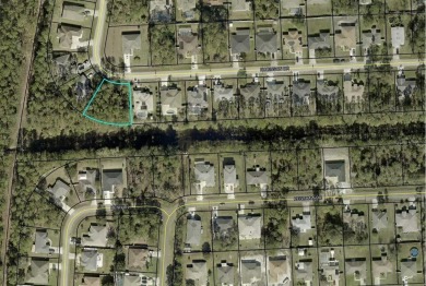 Gorgeous oversize freshwater canal lot located on a lovely on The Grand Club Cypress Course in Florida - for sale on GolfHomes.com, golf home, golf lot