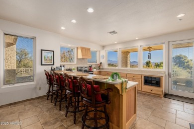 Stunning 4-bedroom view home sitting on a cul-de-sac gentle on Desert Canyon Golf Club in Arizona - for sale on GolfHomes.com, golf home, golf lot