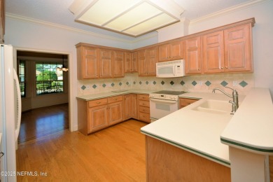 Ready to move-in home on most desirable lot in Cypress Village - on Windsor Parke Golf Club in Florida - for sale on GolfHomes.com, golf home, golf lot