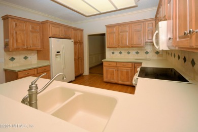 Ready to move-in home on most desirable lot in Cypress Village - on Windsor Parke Golf Club in Florida - for sale on GolfHomes.com, golf home, golf lot