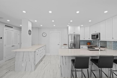 This stunningly remodeled residence boasts a luxurious ambiance on Coral Ridge Country Club in Florida - for sale on GolfHomes.com, golf home, golf lot