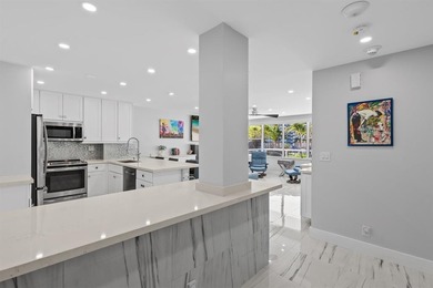 This stunningly remodeled residence boasts a luxurious ambiance on Coral Ridge Country Club in Florida - for sale on GolfHomes.com, golf home, golf lot