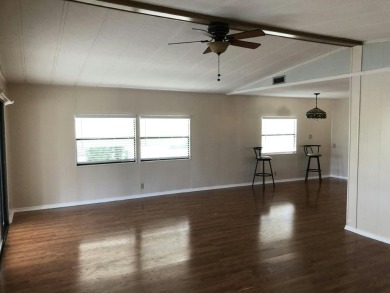 This open floor plan offers a specious kitchen with lots of on Fairways Country Club in Florida - for sale on GolfHomes.com, golf home, golf lot